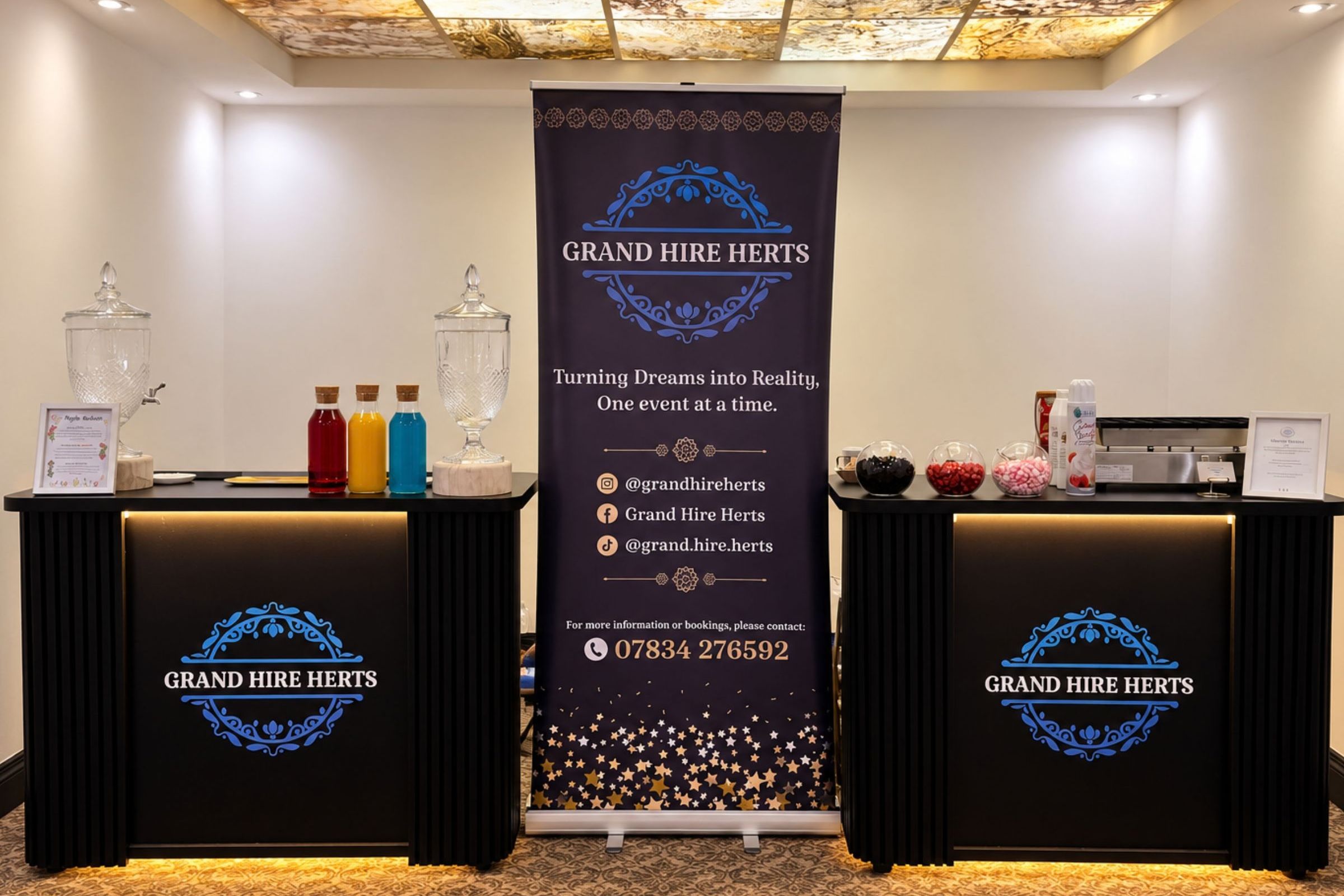 Grand Hire Herts serving stations with branded counters and drinks.